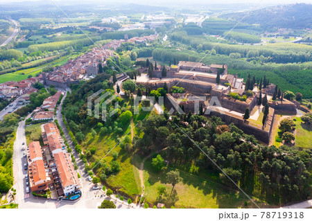 Aerial view of medieval Castle on hilltop in Spanish village of Hostalric Aerial view of medieval Castle on hilltop in Spanish village of Hostalric 78719318