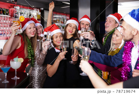 Friendly collective on corporate new year party in bar Friendly collective on corporate new year party in bar 78719674