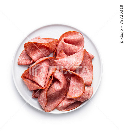 Sliced smoked salami on plate 78720319