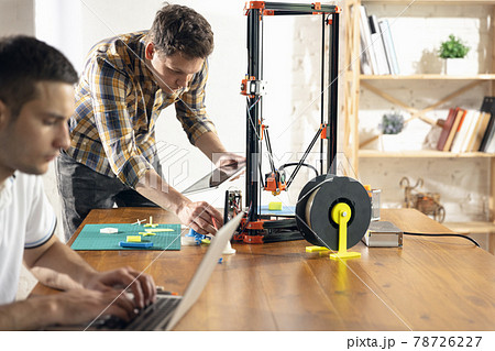 New generation of 3D Printing Machine printing a piece of plastic. For use in small spaces, Office or Private use 78726227