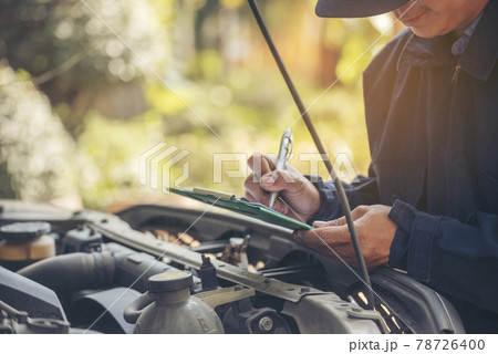 Mechanic car service auto garage in automotive mobile center. Technician workshop repair engine motor vehicles service mechanical engineering business. Automobile mechanic hands car repairs technic 78726400