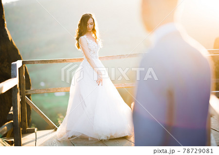 Loving husband and woman on the background of the mountains. Loving couple emotionally spends time 78729081