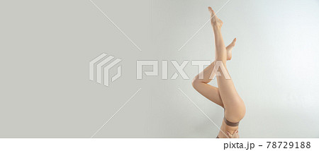 Beautiful female legs isolated on white background. Beauty, cosmetics, spa, depilation, treatment and fitness concept. Fit and sportive, sensual body with well-kept skin in underwear. Beautiful female legs isolated on white background. Beauty, cosmetics, spa, depilation, treatment and fitness concept. Fit and sportive, sensual body with well-kept skin in underwear. 78729188