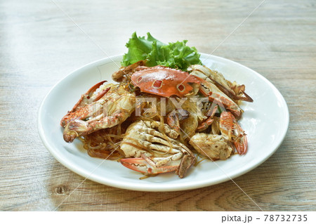 baked flower crab and glass noodles with slice celery on plate baked flower crab and glass noodles with slice celery on plate 78732735