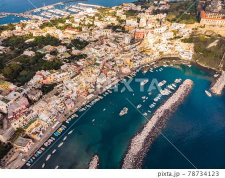 Aerial drone view of Corricella fisherman village in Procida island Naples Italy Aerial drone view of Corricella fisherman village in Procida island Naples Italy 78734123