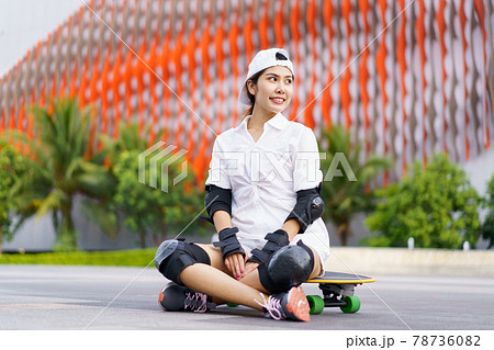 Hello Summer Surfers people Asian having fun with surfboards or surf skate around city streets background on a summer day. Free relax lifestyle and millennial trend concept Hello Summer Surfers people Asian having fun with surfboards or surf skate around city streets background on a summer day. Free relax lifestyle and millennial trend concept 78736082