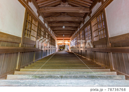 Steep wooden staircase and windows, Eiheiji, Japan. 78736768