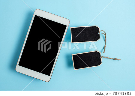 Collection of Real Blank Empty Sticker Card Tag With An Elastic Band On A Different Color Background Containing Modern Gadget Checklist For Labeling Informative Content Purposes 78741302