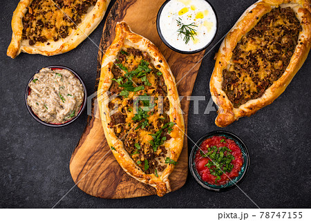 Traditional Turkish pide with meat 78747155