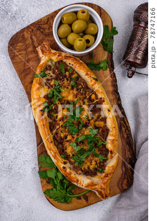 Traditional Turkish pide with meat Traditional Turkish pide with meat 78747166