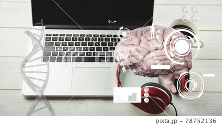 Composition of human brain and medical data processing over desk with laptop computer 78752136