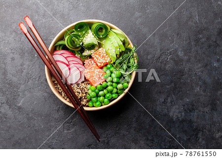 Poke bowl with salmon, cucumber and avocado 78761550