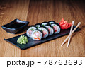 Sushi on a Wooden Table in Restaurant, Delicious Japanese Food, Sushi Rolls 78763693