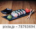 Sushi on a Wooden Table in Restaurant, Delicious Japanese Food, Sushi Rolls 78763694