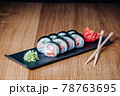 Sushi on a Wooden Table in Restaurant, Delicious Japanese Food, Sushi Rolls 78763695
