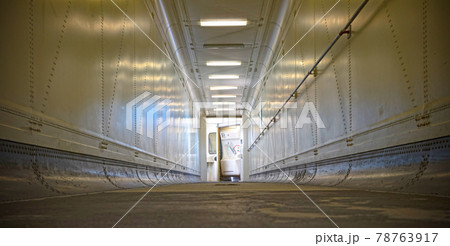 View through door into empty narrow airbridge View through door into empty narrow airbridge 78763917