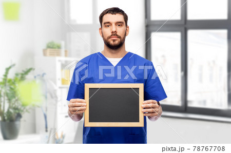 male doctor or nurse with chalkboard male doctor or nurse with chalkboard 78767708