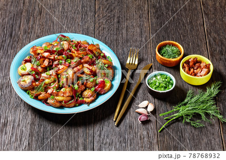 roast potato salad with red onion and bacon 78768932