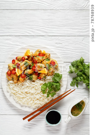 Mango glazed spicy chicken breast chunks with rice Mango glazed spicy chicken breast chunks with rice 78768939