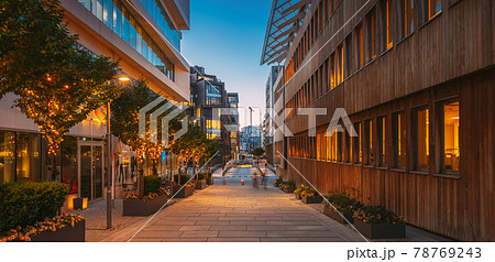 Oslo, Norway. Night View Embankment And Residential Multi-storey Houses In Aker Brygge District. Summer Evening. Residential Area Reflected In Sea Waters. Famous And Popular Place 78769243