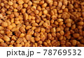 Vegan healthy roasted corn nuts background. Organic sauced corn texture at the spice bazaar in Turkey 78769532