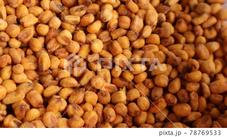 Vegan healthy roasted corn nuts background. Organic sauced corn texture at the spice bazaar in Turkey 78769533