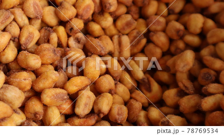 Vegan healthy roasted corn nuts background. Organic sauced corn texture at the spice bazaar in Turkey 78769534