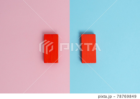 Comparison of Two Objects Blocks Pencils Sticker Notes Facing Inward Outward Making An Arrangement Reflection On a Separated Coloured Background Shot In A Flat Lay Perspective Comparison of Two Objects Blocks Pencils Sticker Notes Facing Inward Outward Making An Arrangement Reflection On a Separated Coloured Background Shot In A Flat Lay Perspective 78769849