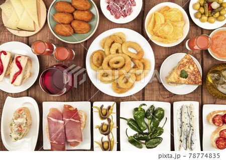 The food of Spain. Overhead photo of many different Spanish tapas 78774835