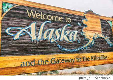 Alaska sign welcome billboad on the South Klondike Highway near Skagway. 78776052