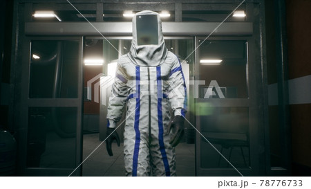 The physicist leaves the elevator and walks down the corridor into the room with the fusion reactor. 3D Rendering. 78776733