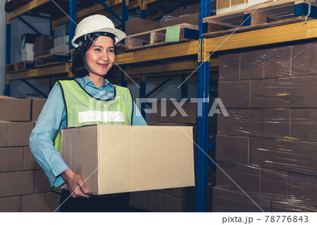 Portrait of young Asian woman warehouse worker smiling in the storehouse 78776843