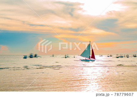 Sailing boat to the sunset in Boracay island Sailing boat to the sunset in Boracay island 78779607