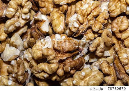 Peeled walnuts background 78780679