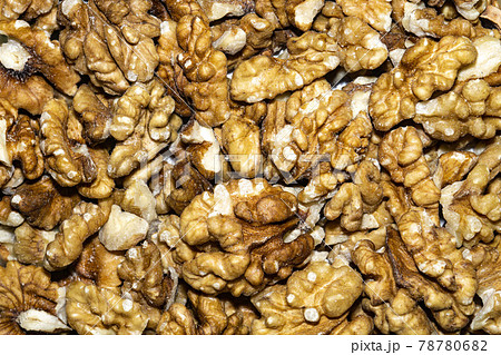 Peeled walnuts background 78780682