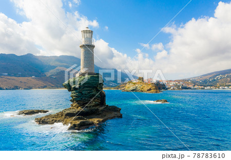 The beautiful Lighthouse Tourlitis of Chora at night. Andros island, Cyclades, Greece The beautiful Lighthouse Tourlitis of Chora at night. Andros island, Cyclades, Greece 78783610