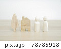 Family wooden peg doll on wood table. Family concept from peg doll. Selective focus. 78785918