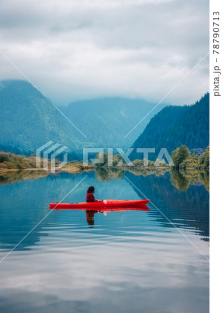 Adventure Caucasian Adult Woman Kayaking in Red Kayak 78790713