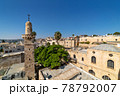 Old minaret among typical houses under blue sky in Old City of Jerusalem, Israel. 78792007
