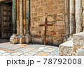 Wooden cross lean against the wall of the Holy Sepulchre church in Jerusalem. 78792008