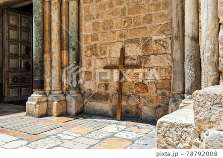 Wooden cross lean against the wall of the Holy Sepulchre church in Jerusalem. Wooden cross lean against the wall of the Holy Sepulchre church in Jerusalem. 78792008