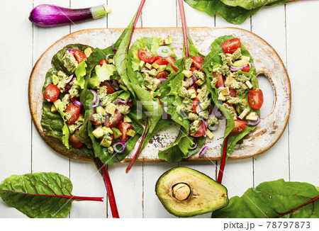 Spring vegetable salad in chard leaves Spring vegetable salad in chard leaves 78797873