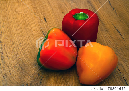 View of fresh multi-colored peppers on the table. Healthy vegetables, healthy food, diet. 78801655