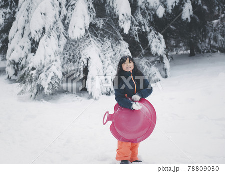 Happy asian girl with Winter view landscape of The trees are covered with snowflakes in frosty winter day, High mountains in Switzerland in the winter of Europe, travel and vacation. 78809030