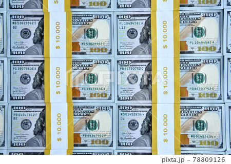 Top view of many bundles of one hundred dollar bills 78809126