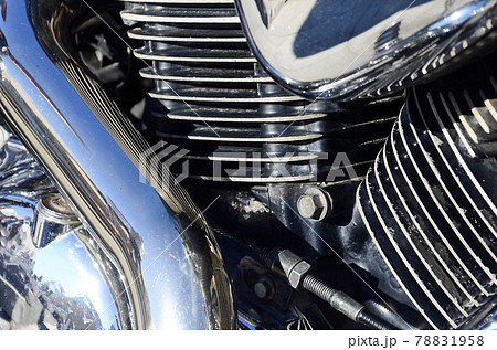 Fragment of chromed shiny body part of old classic motorbike 78831958