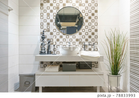 Interior of bathroom with sink basin faucet and mirror. Modern design of bathroom Interior of bathroom with sink basin faucet and mirror. Modern design of bathroom 78833993