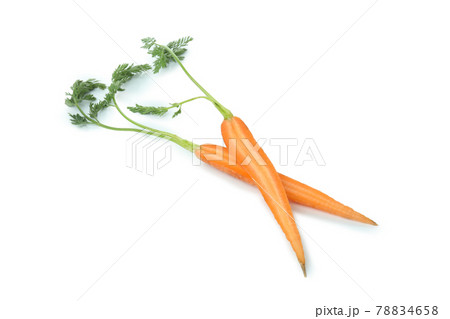 Fresh carrot halves isolated on white background Fresh carrot halves isolated on white background 78834658