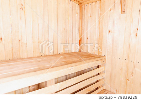 Interior details of traditional Finnish sauna steam room. Traditional old Russian bathhouse SPA Concept. Relax country village bath concept. Interior details of traditional Finnish sauna steam room. Traditional old Russian bathhouse SPA Concept. Relax country village bath concept. 78839229