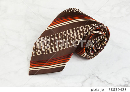 Brown tie with pattern 78839423